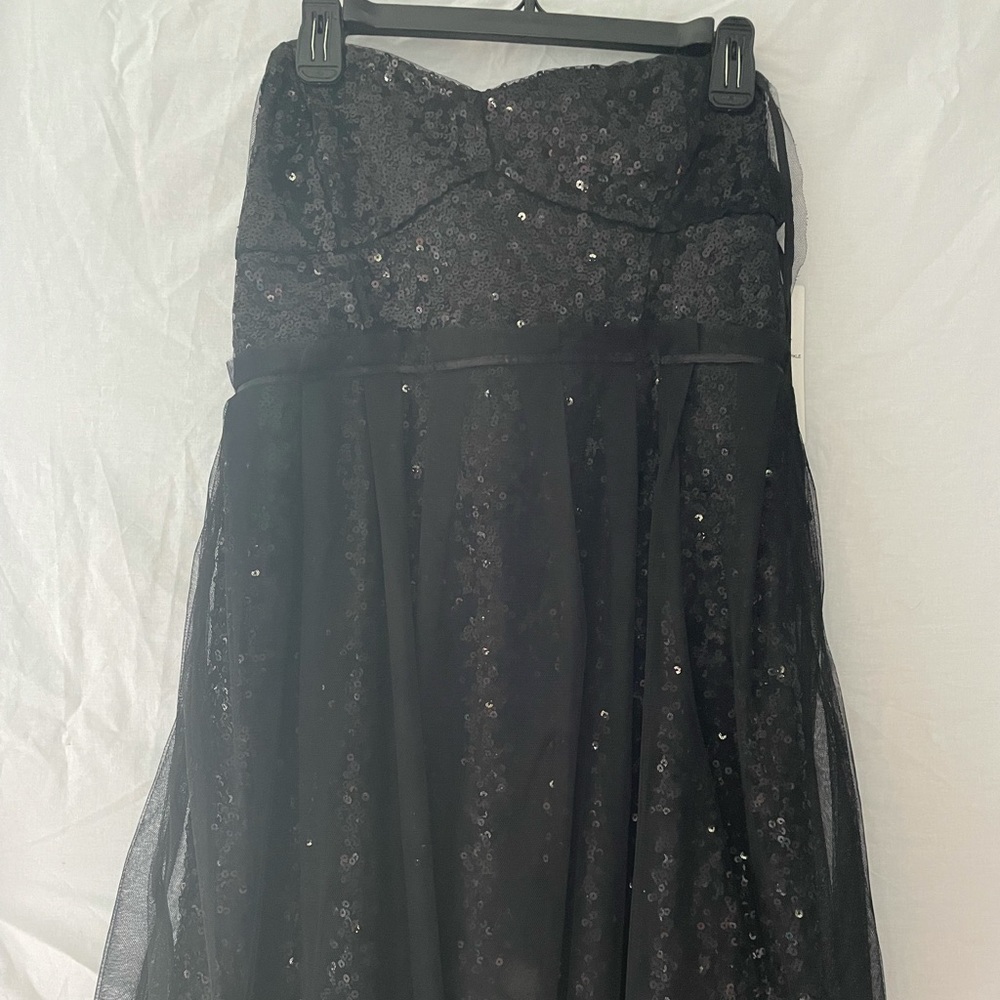 Black short sequin prom/homecoming dress. New with tags. Never been worn.